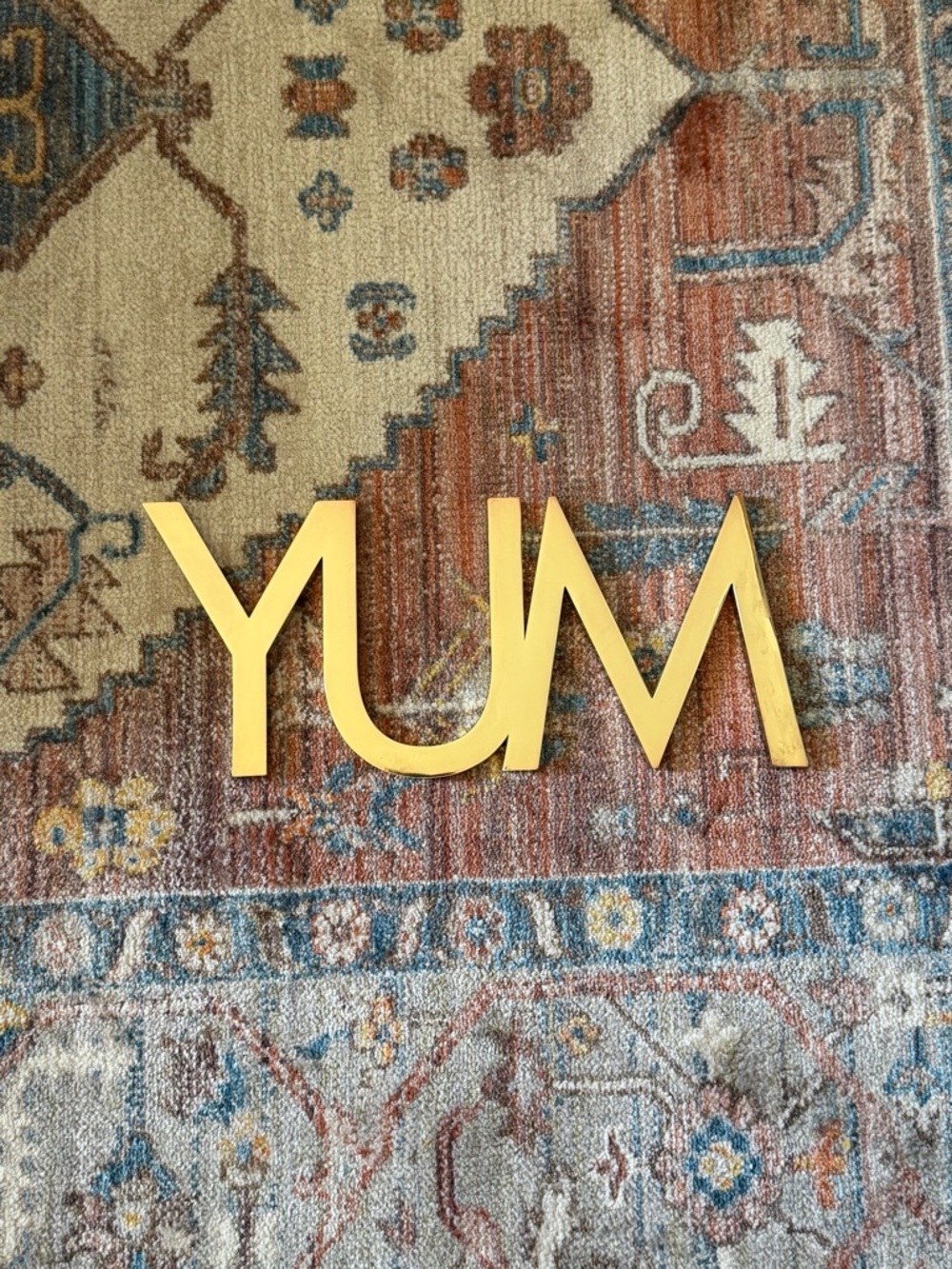 Decorative 'YUM' Metal Trivet for Kitchen or Bar - Gold Finish